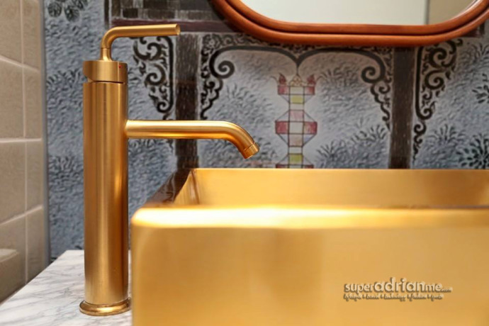 Gold basins and taps in the bathrooms at Chaiyapruek Executive Room at Hotel Indigo Bangkok Wireless Road