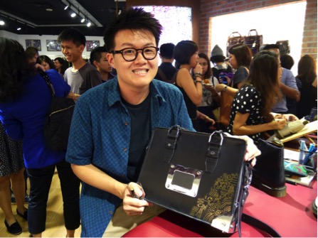 Kaiyee Tay forms part of the duo customising Dr. Martens for guests during the launch.