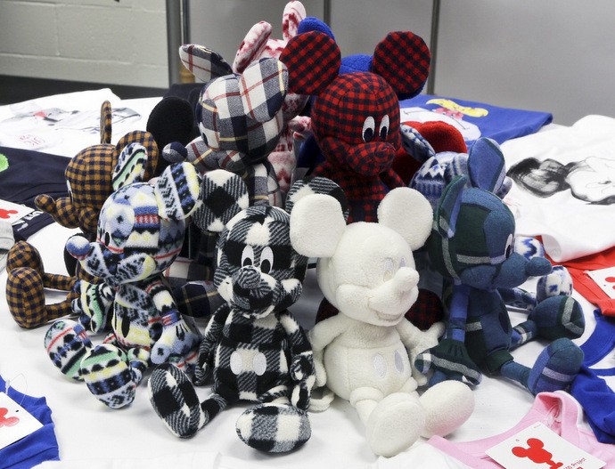 A selection of the new PlushMickey Mouse in UNIQLO’s signature fleece and flannel fabrics, with a