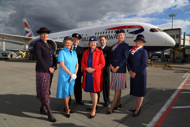 Wearing the uniforms they wore when they flew The Queen, British Airways crew celebrate (C) Geoff Caddick-Press Associatio_LR