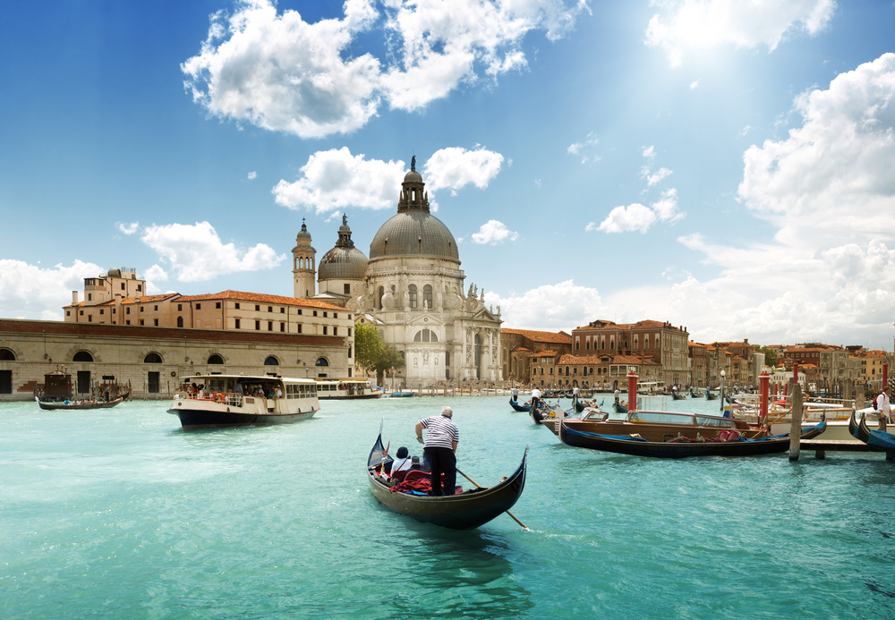 Grand Canal and Basilica Santa Maria della Salute, Venice, Italy and sunny day (Shutterstock Image)
