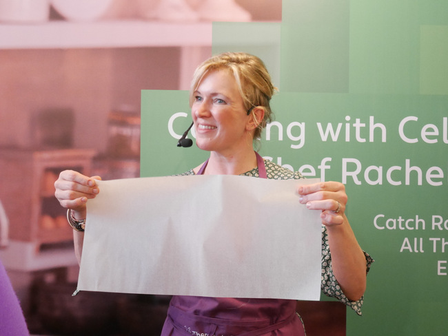 Rachel beginning her demo on how to make peanut brittle with the help of a baking paper.