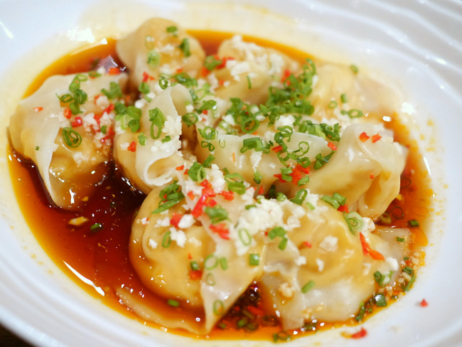 Poached Dumplings with Fresh Prawns, Hairy Crab Meat and Roe in Chilli Oil (S.80/3 Pieces).