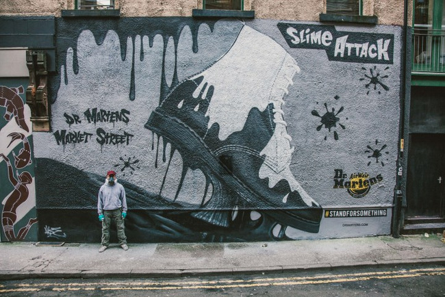 French Street Artist Akse does a free-hand mural of the new Splash Mono collection on Back Turner Street in Northern Quarter.