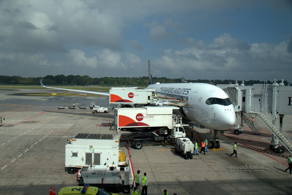 Aviation - Singapore Airlines A350-900 Aircraft at Changi Airport with SATS Gateway Trucks