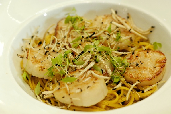 Handmade Tagliolini with Scallop and Truffle Handmade Tagliolini with Japanese Hokkaido Scallops and fresh Spring Truffles from Italy. Served with tomato- based Crab and Prawn sauce.