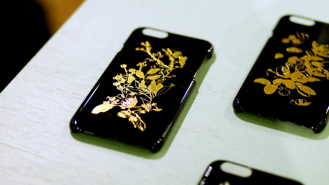 Intricate phone cases for iPhones.