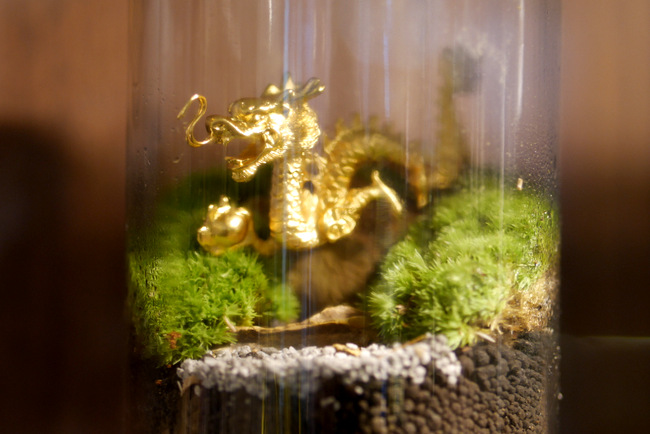 The Chinese Zodiac collection is presented in terrariums, in collaboration with Mossingarden. Pictured here is the dragon.