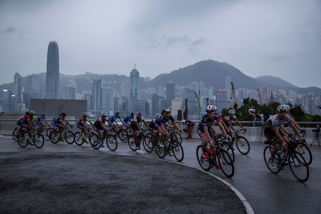 HONG KONG - OCTOBER 11: Cyclists participate in a race during the Sun Hung Kai Properties Hong Kong Cyclothon on October 11, 2015 in Hong Kong. Hong Kong holds its first two-day bicycle race organised by the Hong Kong Tourism Boardm with Sun Hung Kai Properties. (Photo by Lam Yik Fei/Getty Images for Hong Kong Images)