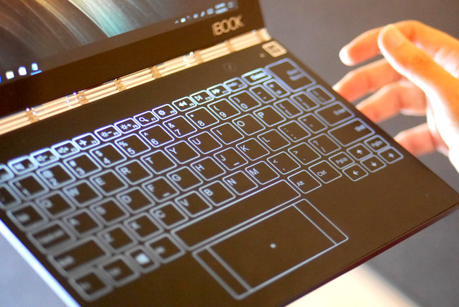 Lenovo Yoga Book switches into laptop mode which a quick press of the pen icon to activate the Halo keyboard.
