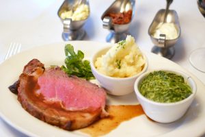 One of the mains for Morton's The Steakhouse lunch menu is the 16oz. Slow Roast Prime Rib, served with mash potatoes, creamed spinach and condiments.