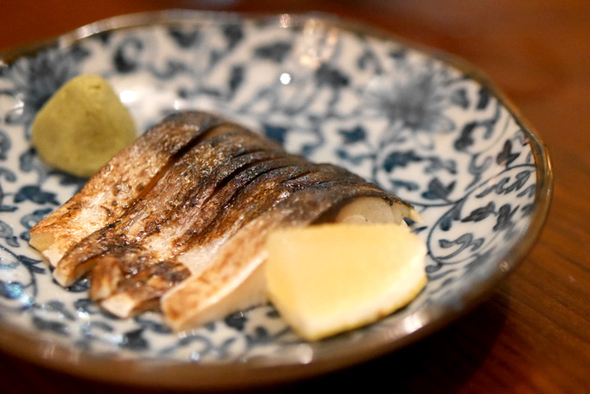 The Shukuu exclusive sake is well paired with the grilled mackerel.