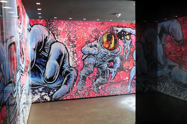 Phuture at Zouk Singapore is accessible through a tunnel lined with grati-esque artwork from local artist Jahan Loh.