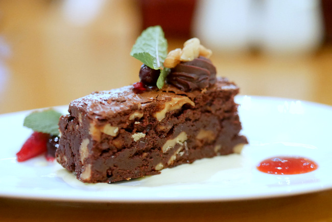 Flourless Brownie with Mixed Wild Berries Compote from the Gluten-free lunch and dinner set menu at Town Restaurant at The Fullerton Hotel.