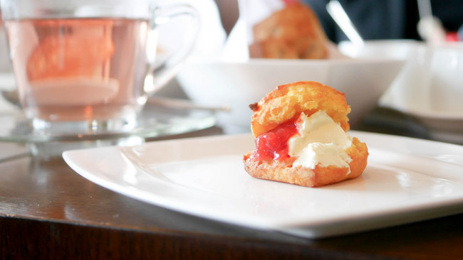 Axis Bar and Lounge will be serving up a Mango Afternoon Tea during May 2017 at S++/2 pax or S++/pax. Pictured here is the third course, a mango yoghurt scone with cream and strawberry jam.