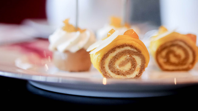 Axis Bar and Lounge will be serving up a Mango Afternoon Tea during May 2017 at S$80++/2 pax or S$42++/pax. Pictured here is a Mango Palm Sugar Souffle Roll.
