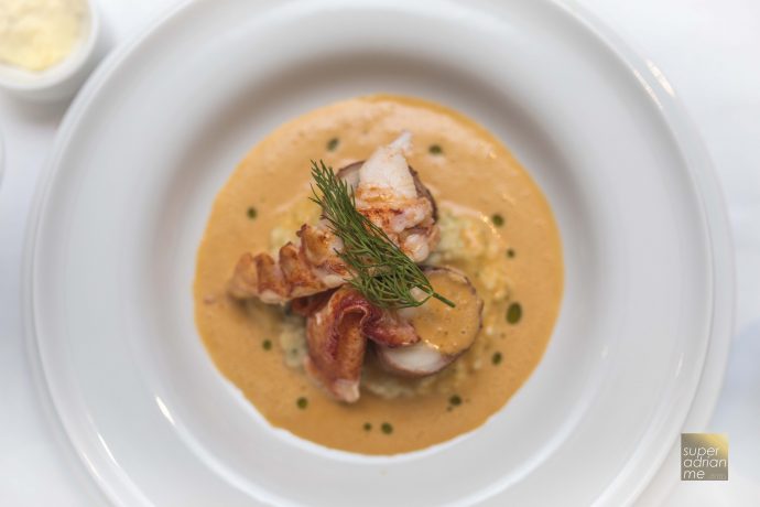 Prosciutto Ham Wrapped Monkfish and Maine Lobster on Risotto in Armagnac Lobster Bisque (S++) at Tablescape