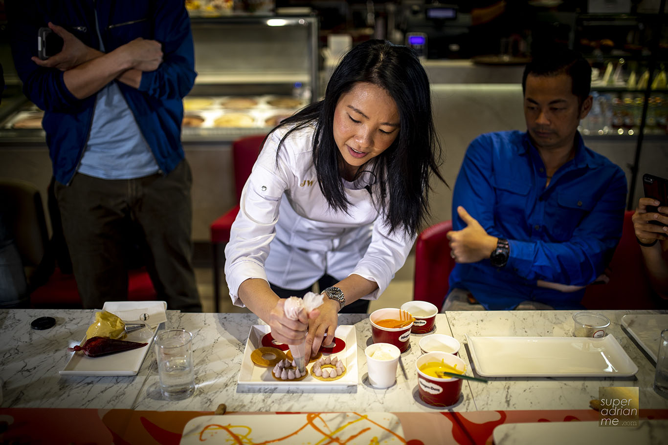 Janice Wong giving a demonstration of how Cloud Nine is made at Häagen-Dazs ION Orchard