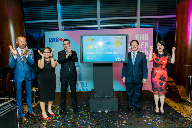 RHB TravelFX was launched on 18 September 2018 by (L to R) Ng Fook Sun, Executive Vice President, Financial Institutions, Wirecard, Clara Lee, Head, Technology & Operations, RHB Singapore, Chris Skok, Head of Product, Singapore and Brunei, VISA, Mike Chan, Country Head & CEO, RHB Singapore, and Wong Chung Yee, Head, Personal Financial Services & Wealth Management, RHB Singapore (RHB Singapore photo)
