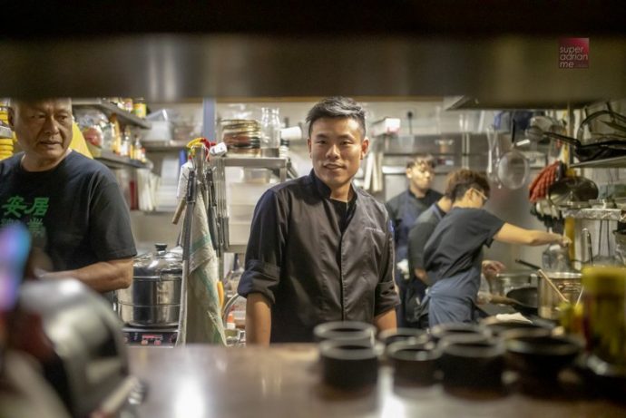 Jeremmy Chiam (centre) and Damian D'Silva (left) in the kitchen of Le Binchotan