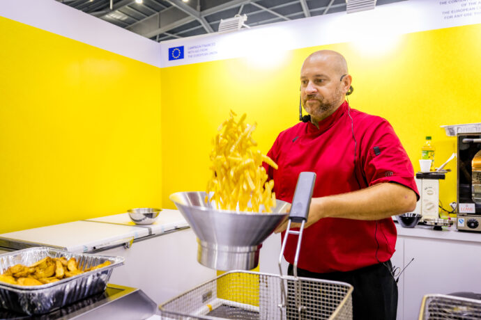 Chef Bart Sablon tossing the Belgian Fries, seasoned with salt (Flanders' Agricultural Marketing Board (VLAM) photo)