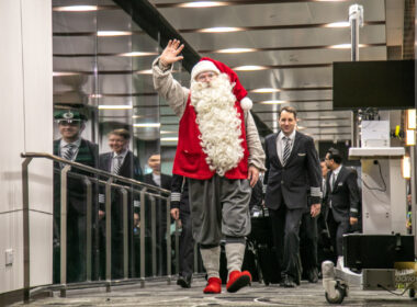 Santa Claus disembarks from Finnair flight AY131 from Helsinki on 8 December 2022