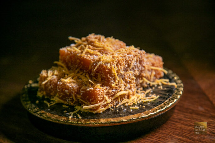 Hai Tien Lo - Prosperity Chinese New Year Cake coated with Finely-ground Nuts and Shredded Yam
