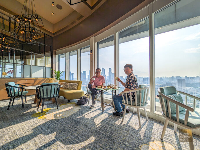Pan Pacific Singapore Club Lounge with a panoramic view of Singapore's skyline.