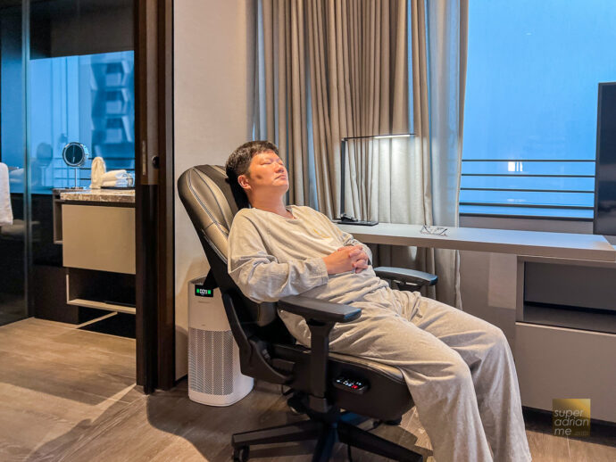 OSIM uThrone V Gaming Chair in the Wellness Suite bedroom at Dao by AMTD