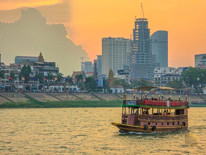 Cruise down the Mekong River during sunset 