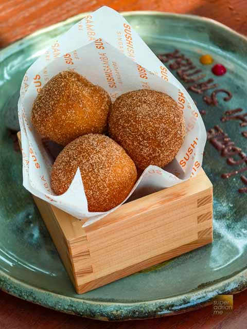 SUSHISAMBA - Japanese Doughnut Andagi with black sesame ice cream