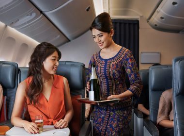 Premium Economy_Serving_Champagne