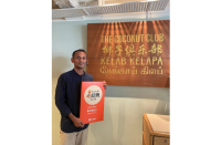 On behalf of Dianping, SpoonX presented a certificate to The Coconut Club for being featured on the 2024 'Must-Eat List' in Singapore