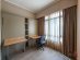 Smaller bedroom with two Murphy single beds in the Great World Residences 3 bedroom apartment