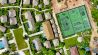 Drone shot of Tennis courts and Villas at JATI Koh Russey
