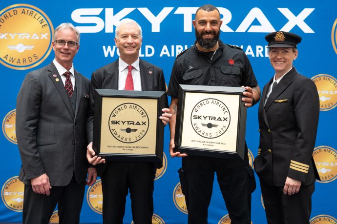2025-06-17-skytrax-cdg-z63-9593 | SUPERADRIANME.com AIR CANADA - SKY TRAX 2025 - Air Canada President and CEO, Michael Rousseau, flanked by employees, accepts the 2025 Skytrax Award.