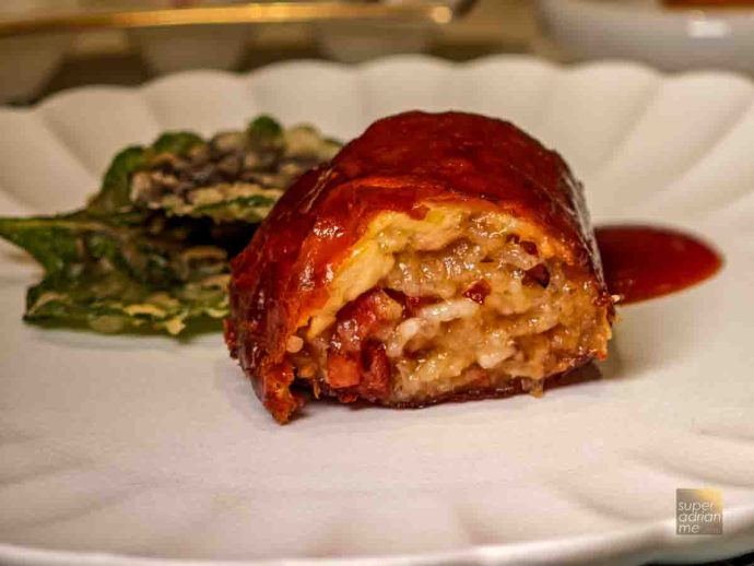 Golden Phoenix Glutinous Rice Roll in Gtraditional Style  (S for whole chicken) available at all Crystal Jade Fine-Dining Restaurants