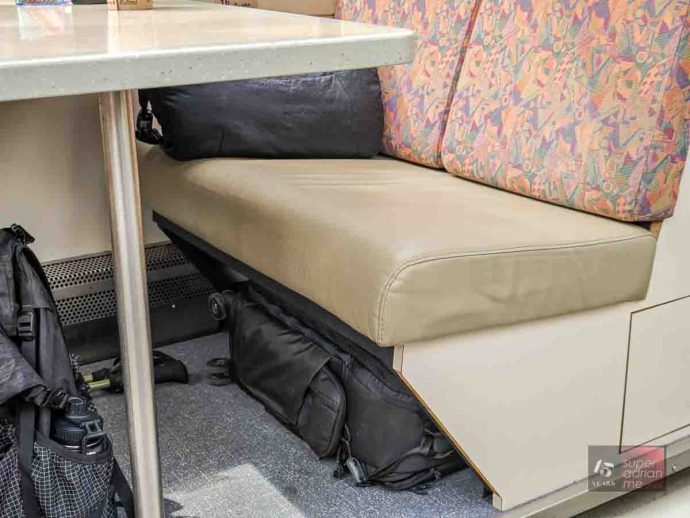 Backpack or carry on baggage space under seats onboard Alaska Railroad trains