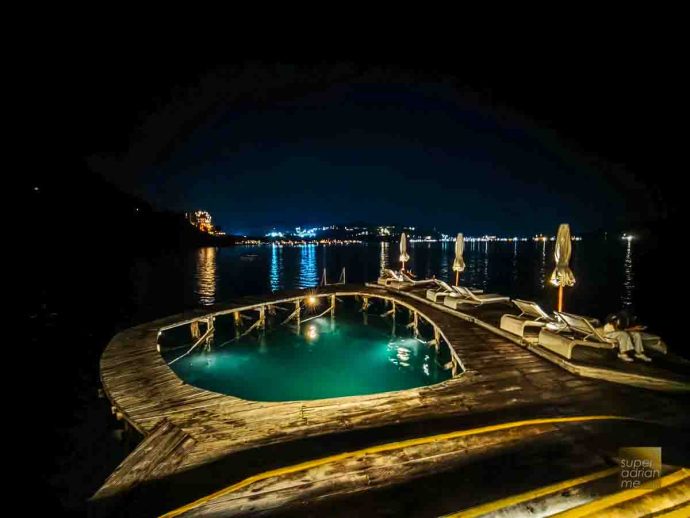 Ayana Komodo Waecicu Beach - July 2025 -210410 | SUPERADRIANME.com The Jetty Pool after Dark at AYANA Komodo Waecicu Beach