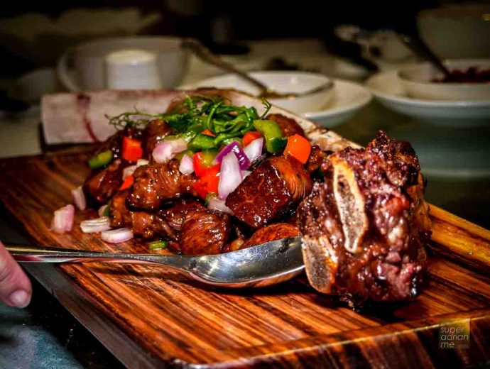 Man Fu Yuan - Flambé Roasted Angus Beef Tomahawk with Mongolian Sauce and Spices