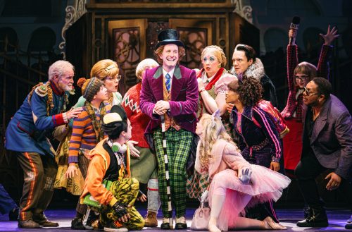 Coleman Simmons as Charlie Bucket and Claire Leyden as Mrs. Bucket. Roald Dahl’s CHARLIE AND THE CHOCOLATE FACTORY. Photo by Jeremy Daniel