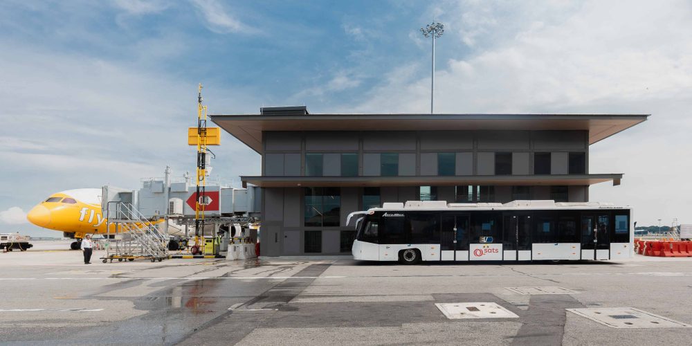 Satellite gate exterior with bus