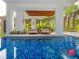 SUPERADRIANME WEAVE SUITES NOVENA STAY – May 2026 -152703 Relaxing areas around the pool at WEAVE SUITES NOVENA (SUPERADRIANME photo)