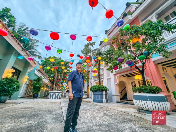 SUPERADRIANME - JW Marriott Phu Quoc Emerald Bay - July 2026 -182337 | SUPERADRIANME.com Lanterns overhead at Rue de Lamarck at JW Marriott Phu Quoc Emerald Bay